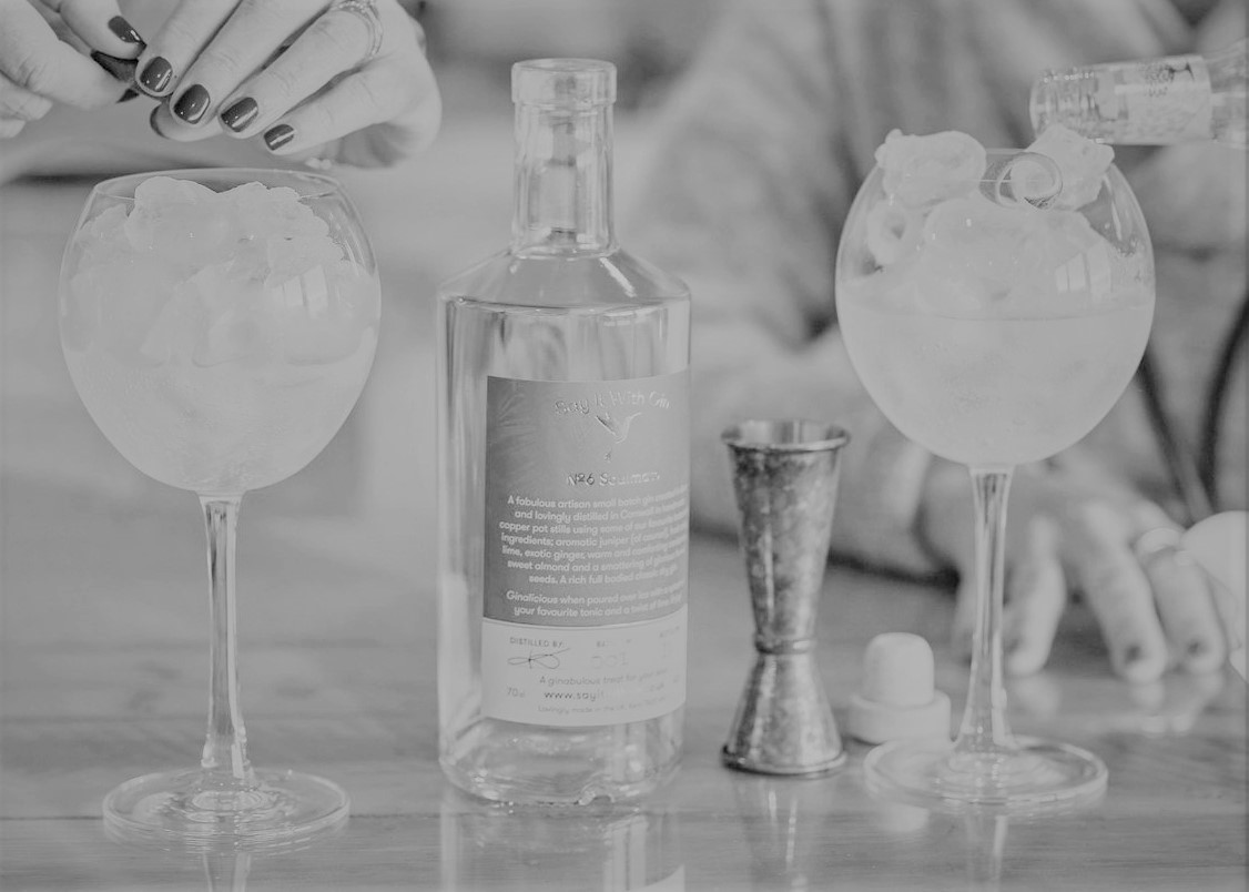 Stylish bottle of premium gin, highlighting its elegant design and rich flavors – Say it with Gin