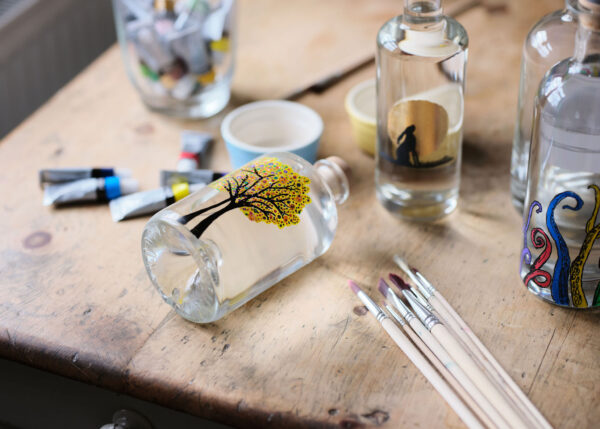 Artfully painted gin bottle, showcasing unique designs and craftsmanship that reflect the essence of premium gin – Say it with Gin.