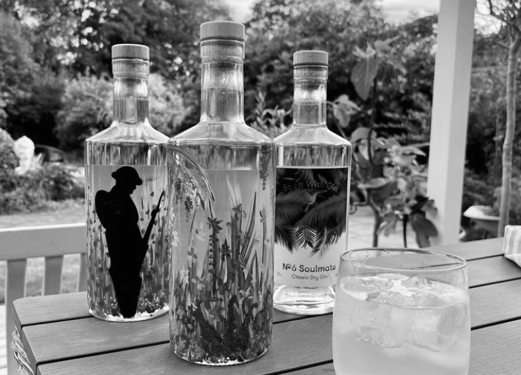 Artfully painted gin bottle, showcasing unique designs and craftsmanship that reflect the essence of premium gin – Say it with Gin.