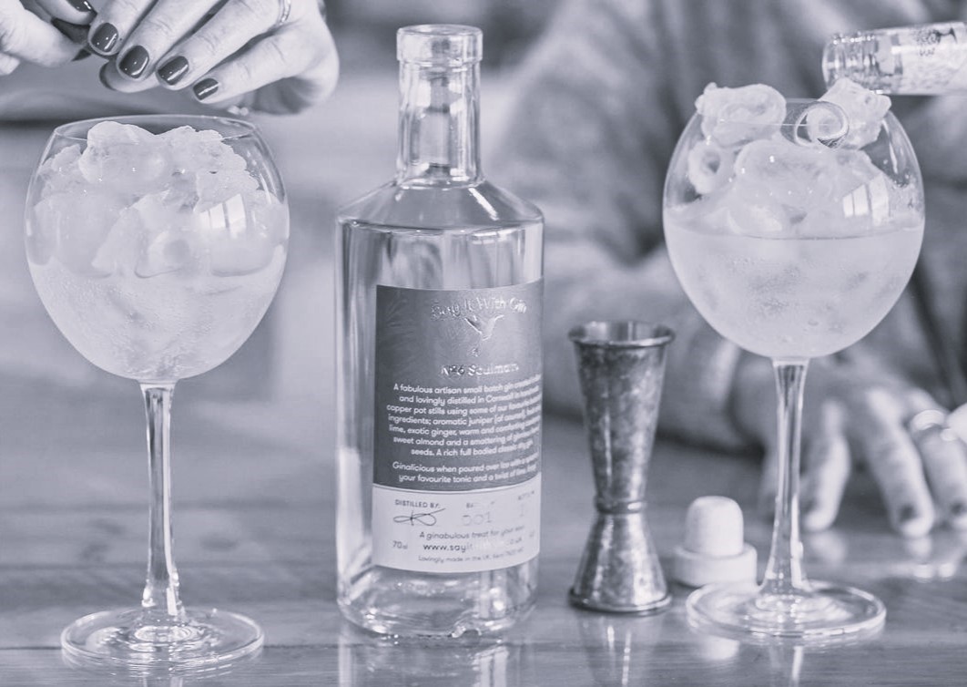 Stylish bottle of premium gin, highlighting its elegant design and rich flavors – Say it with Gin